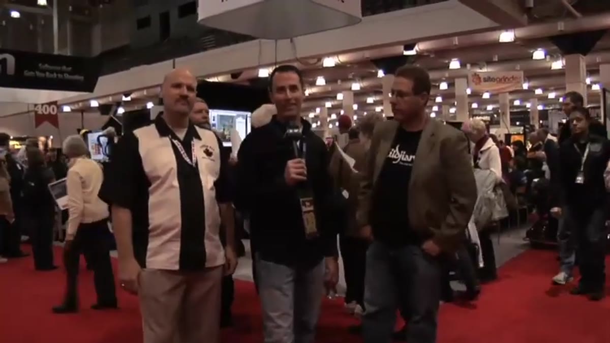 Scott Kelby walking into the Adobe conference booth