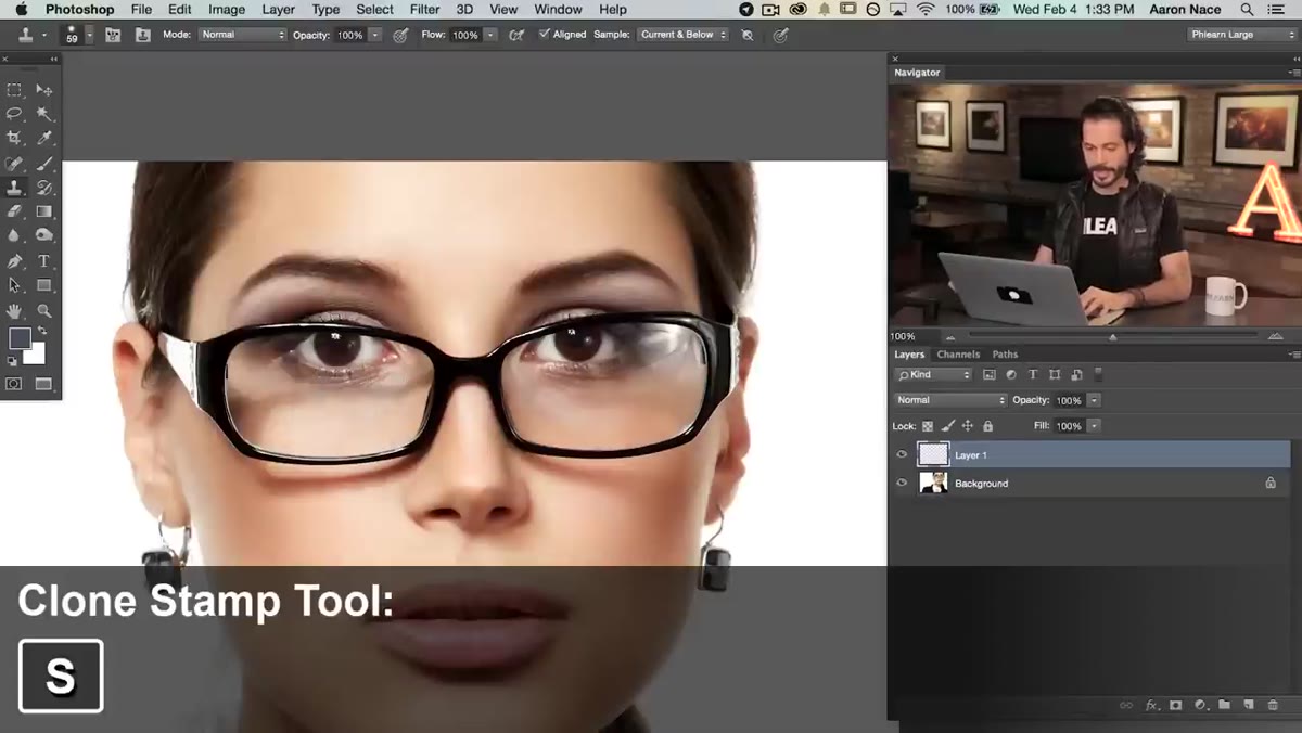 Clone Stamp tool selected with new blank layer active