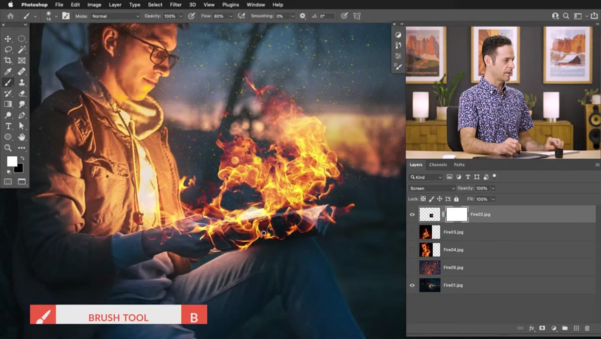 Painting black on a layer mask to hide fire from the subject&rsquo;s hand