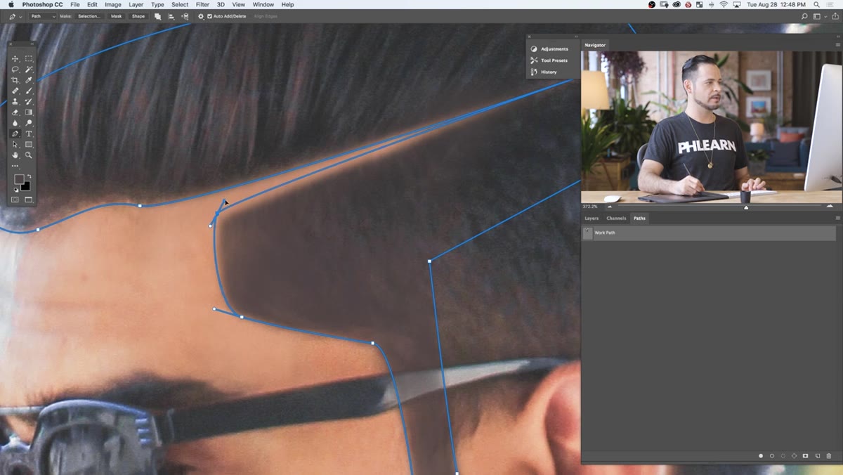 Custom Photoshop hair brush being stroked along the hairline