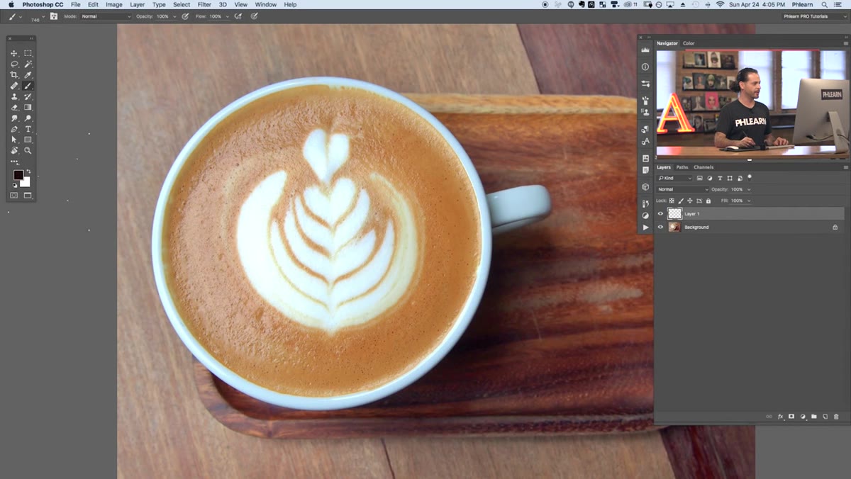 Red brush strokes painted over latte photo to demonstrate coverage
