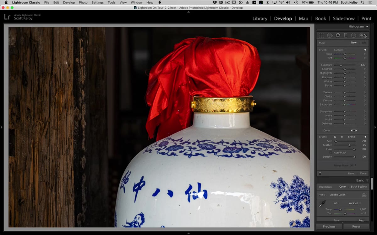Adjustment brush painting over bright highlight area to pull back detail