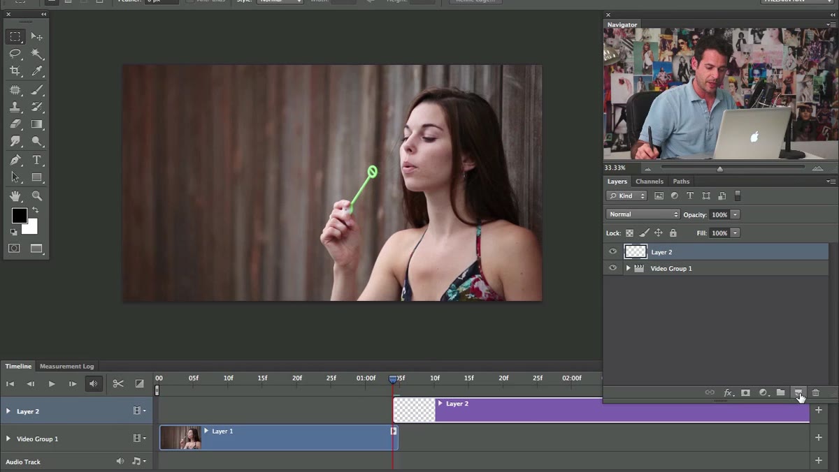 New blank layer created above the video layer in the Layers panel