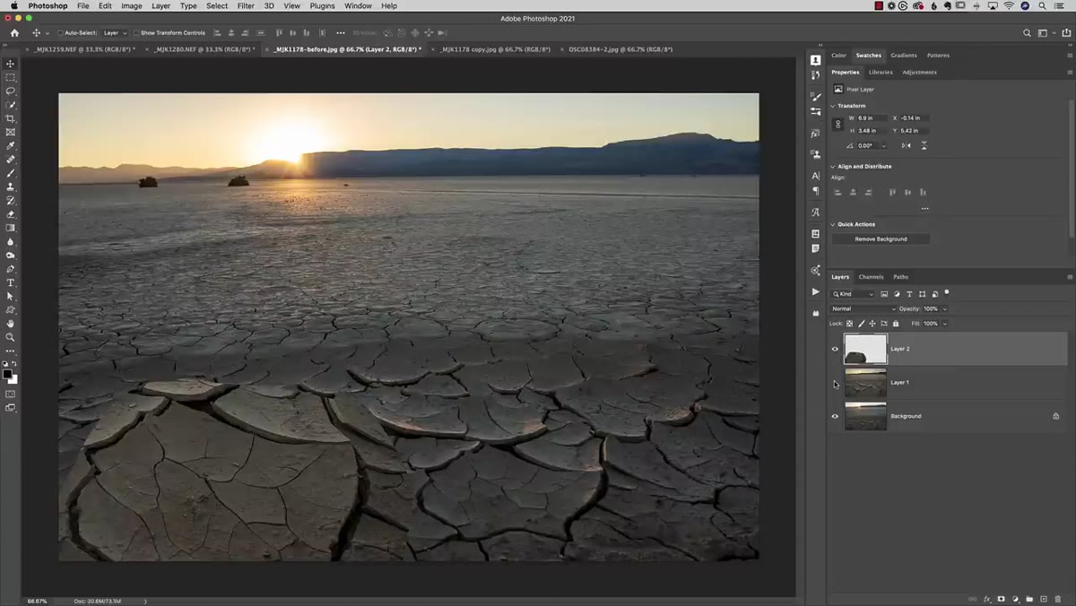 Camera positioned low and close to dry desert floor
