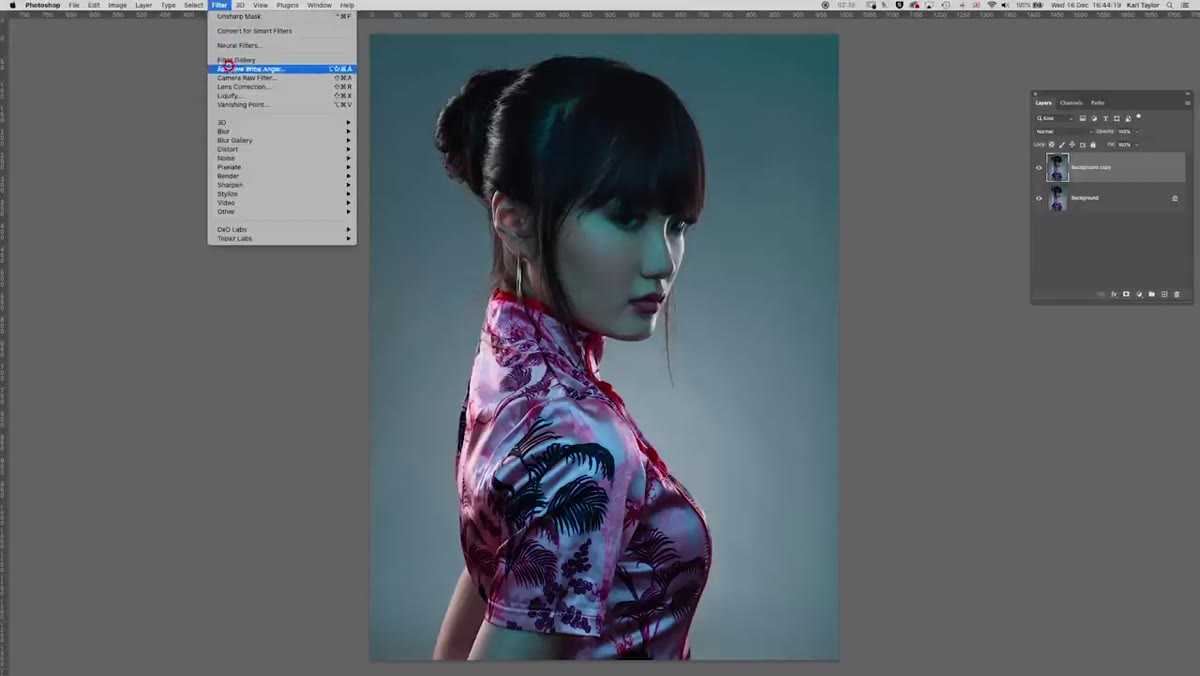 Photoshop layers panel with background layer being duplicated
