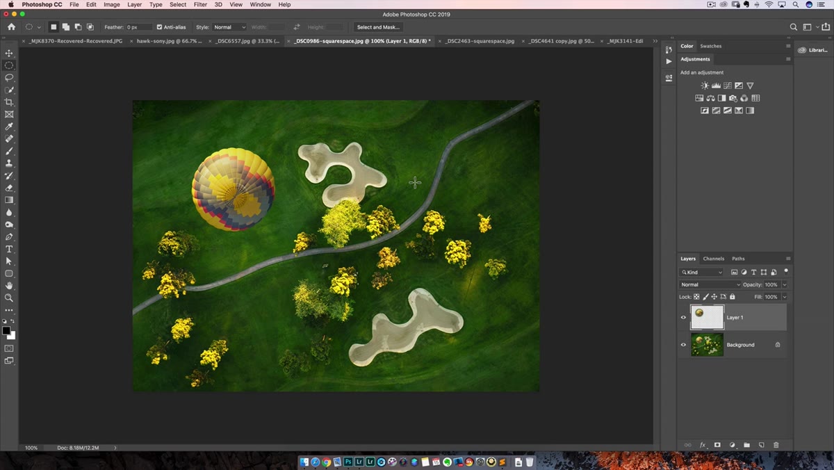 Layers panel showing a new layer created above the background