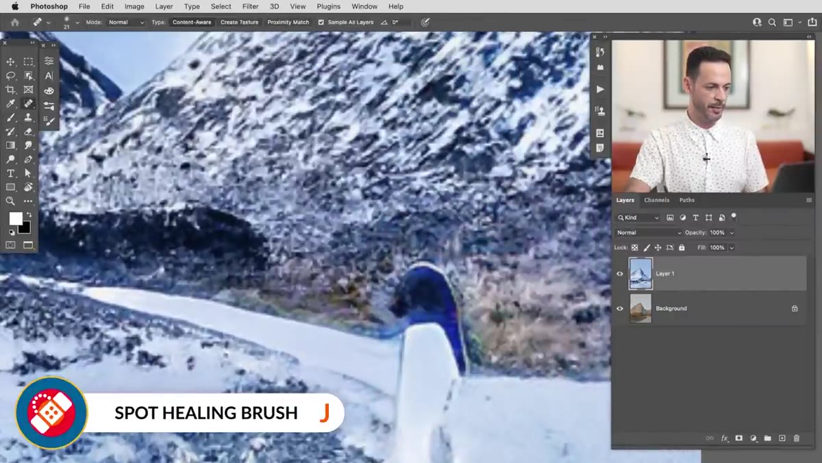 Spot Healing Brush being used to remove subject from landscape layer