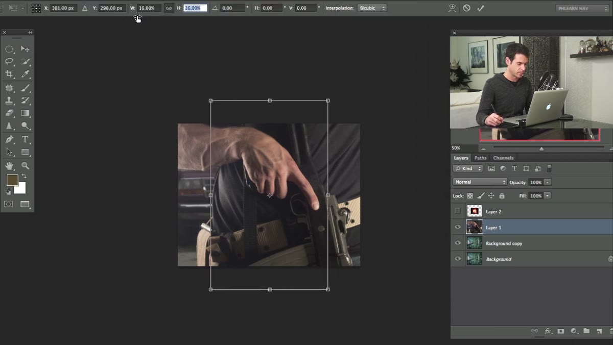John&rsquo;s layer being scaled down with Free Transform handles visible