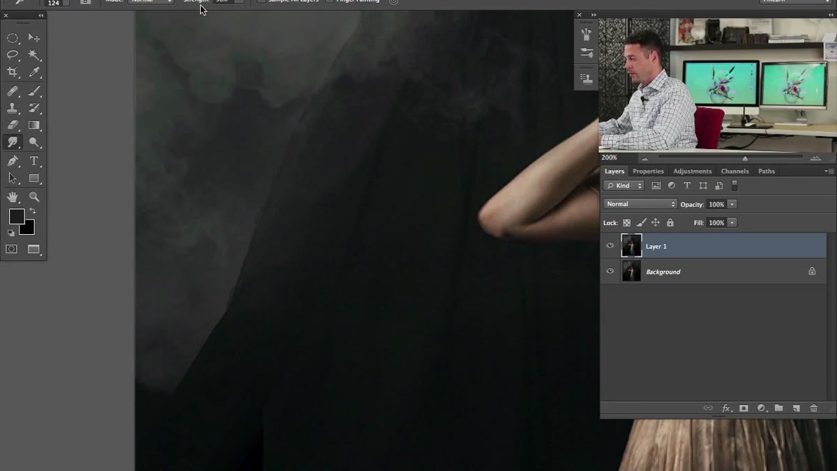 Smudge tool applied back and forth along ghost figure edge