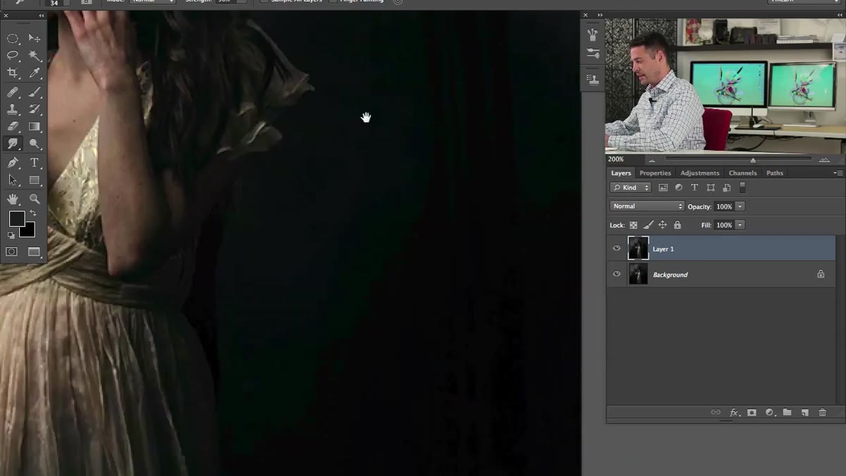 Smudge tool being used along the dress at bottom of frame