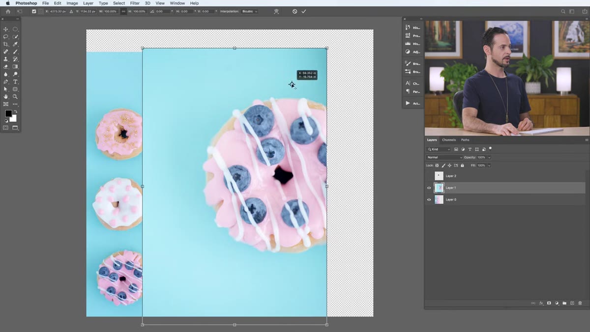 Transform handles visible on canvas with rotation cursor shown outside bounding box
