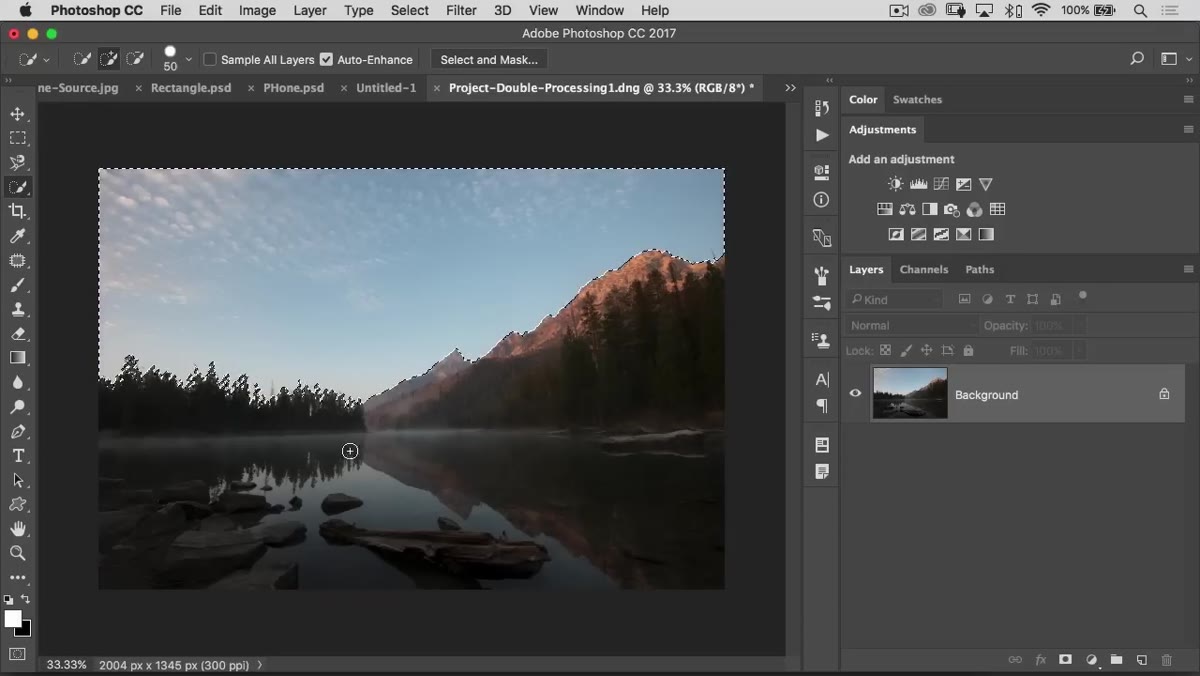 Select menu open with Color Range dialog box visible, eyedropper sampling sky color
