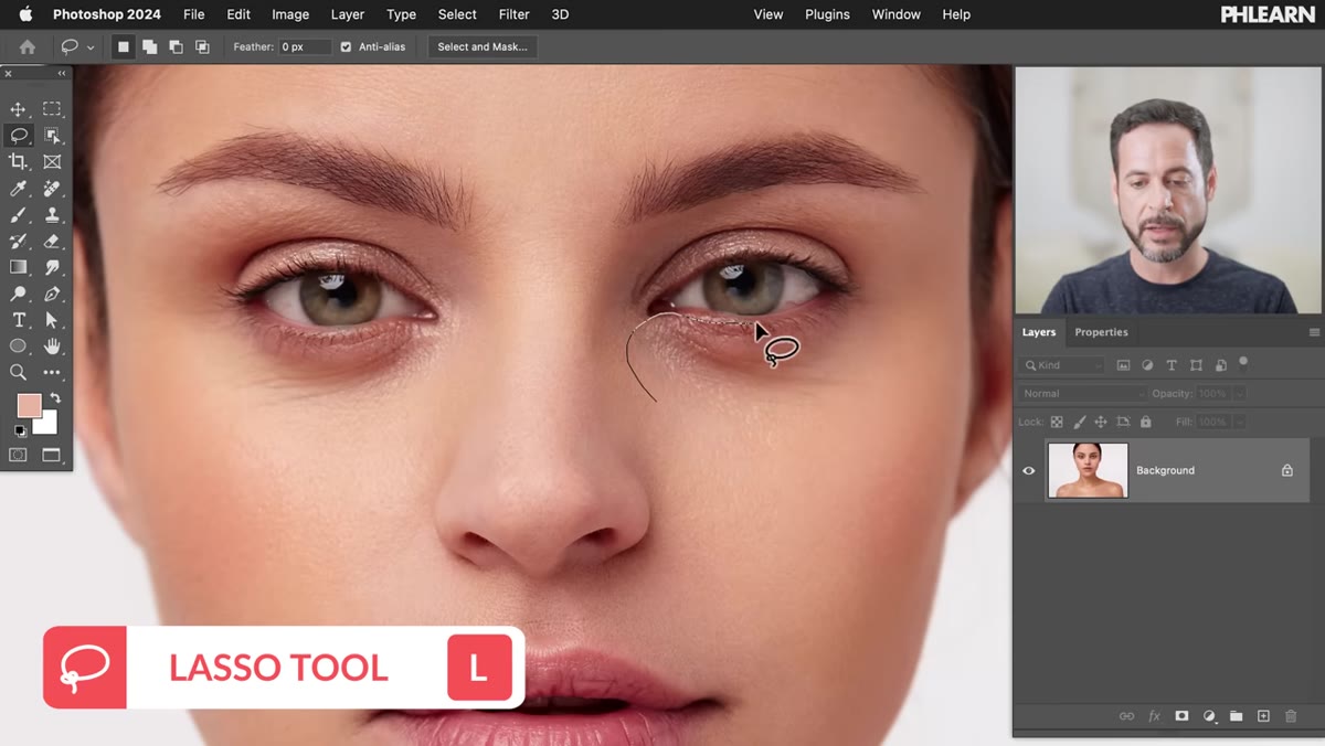 Lasso tool tracing under-eye area on subject
