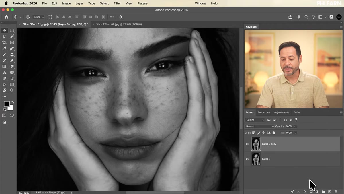 New blank layer created above both photo layers