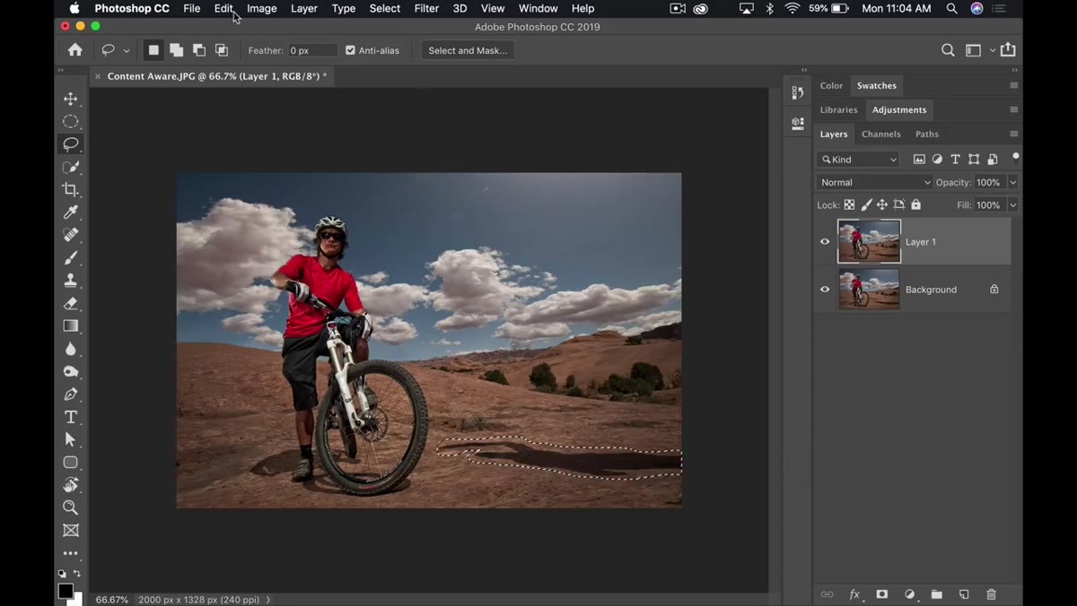 Lasso tool active with selection drawn around shadow on ground